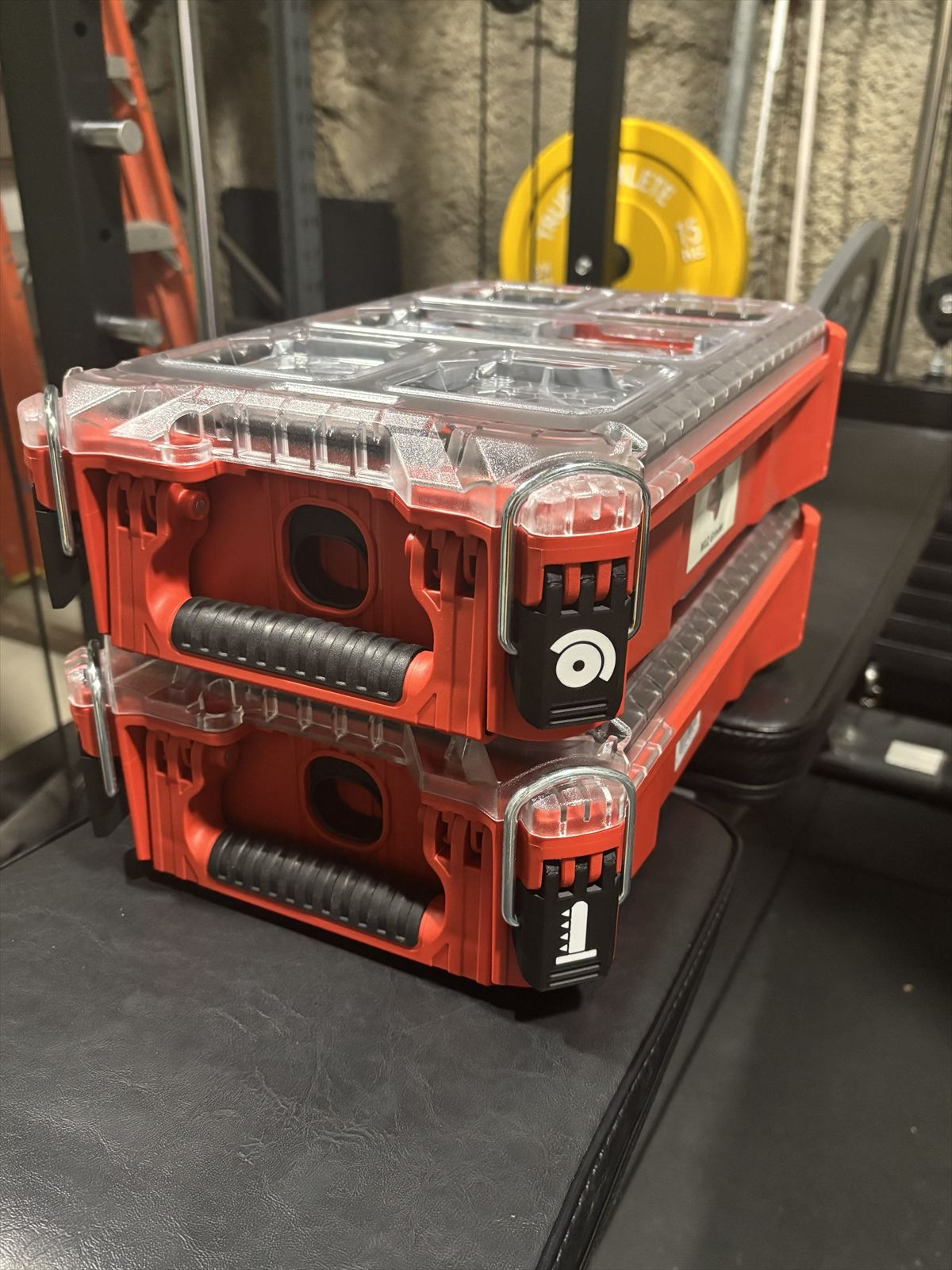 Red tool-case latches printed as replacement parts, fitted to a toolbox